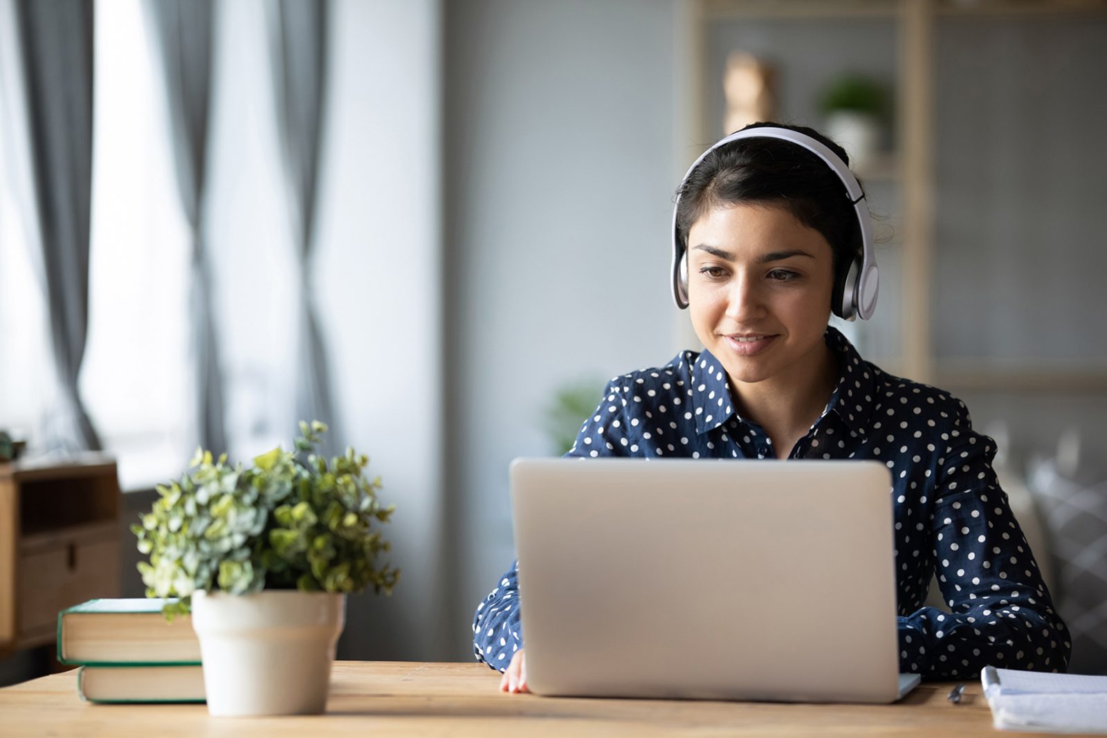 Girl searching on a laptop